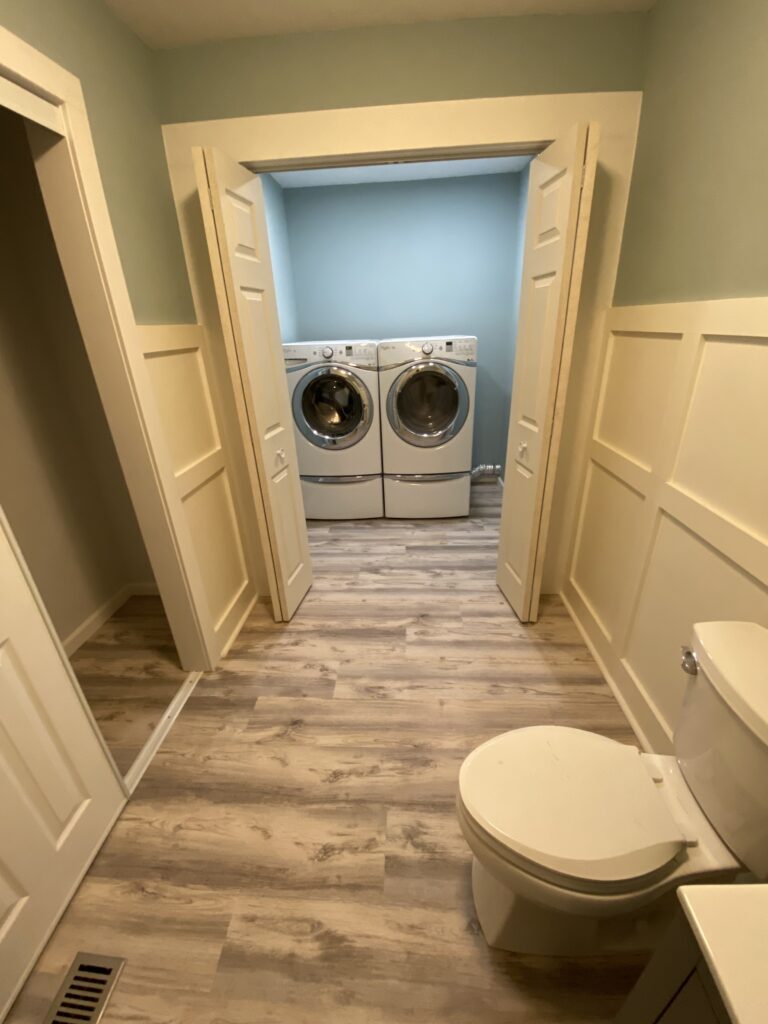 laundry room with storage
