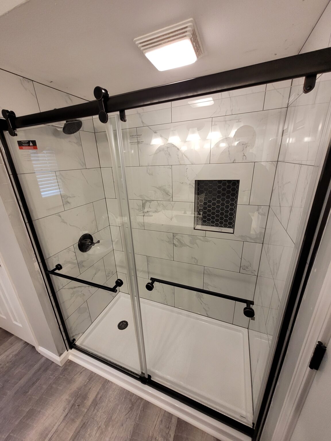 Tile Shower with Matte Black Fixtures - Bathroom Remodeling