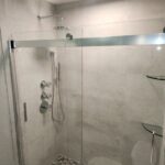 Convert a tub to a tiled shower