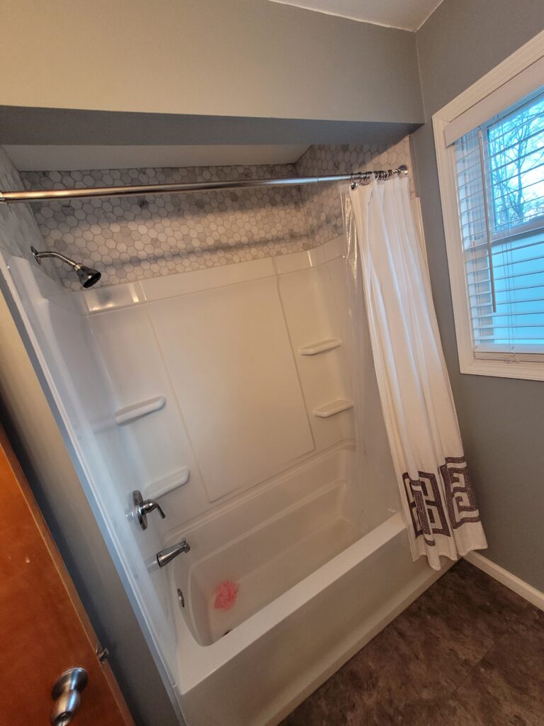 shower with a shower tower