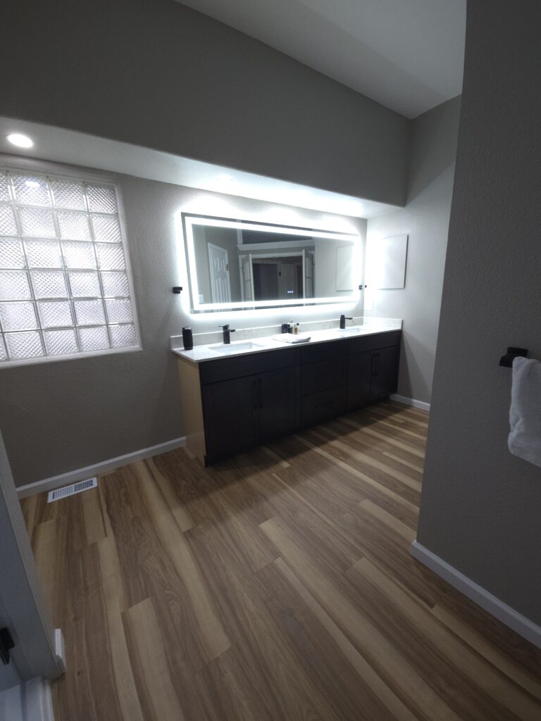 Bathroom with Large LED Mirror
