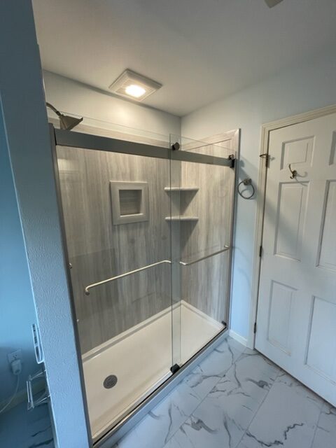 Flexstone shower enclosure